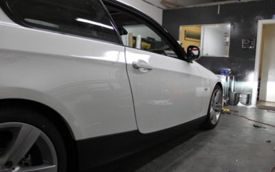 BMW 335i Roof, side skirts and the bumper grill all wrapped in carbon fiber